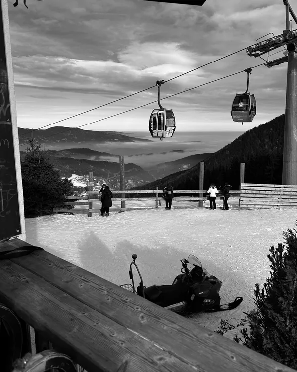 Gondolas above the clouds at the top station